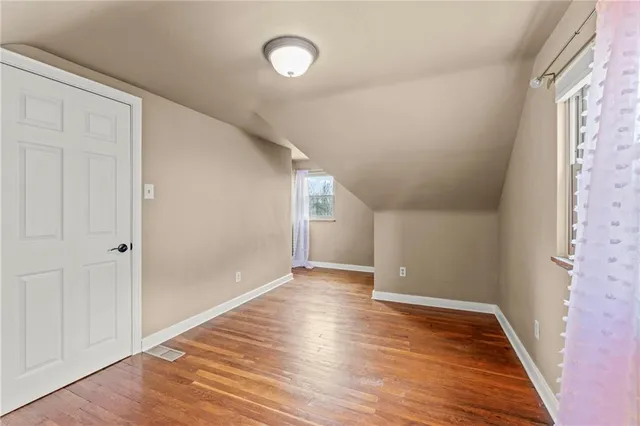 a picture of a bench in a white building