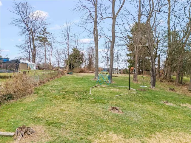 a view of a town with large trees