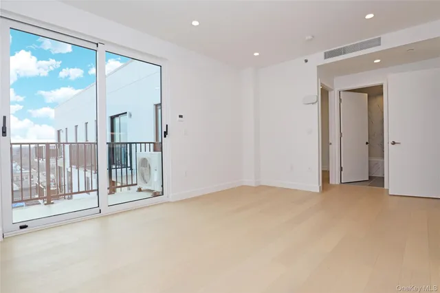 an empty room with an entryway