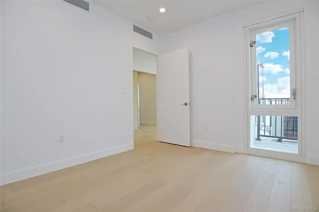 a kitchen with a stove and a refrigerator