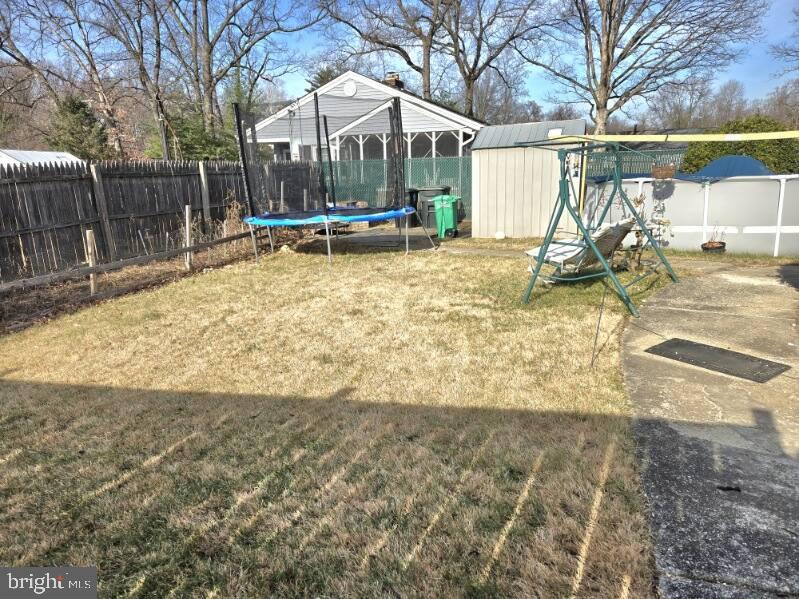 9104 8th Street Lanham, MD 20706 - Photo 4 of 4 a view of a yard with a slide