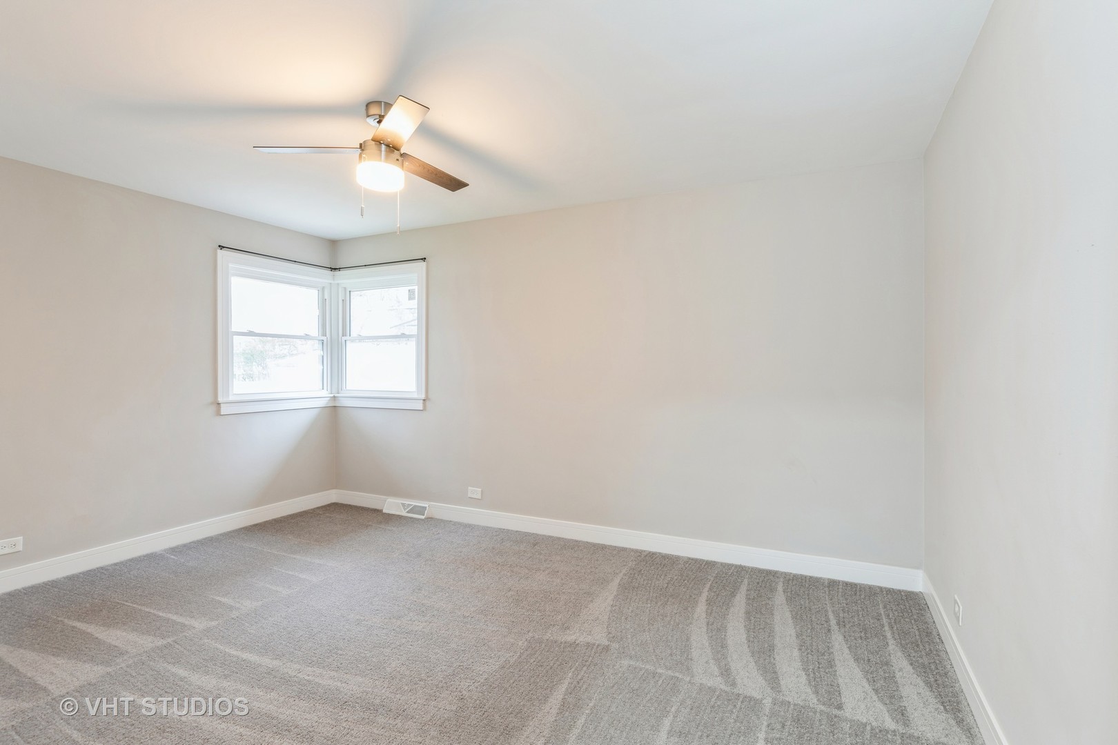 1033 Braemar Road Flossmoor, IL 60422 - Photo 10 of 15 an empty room with windows and fan