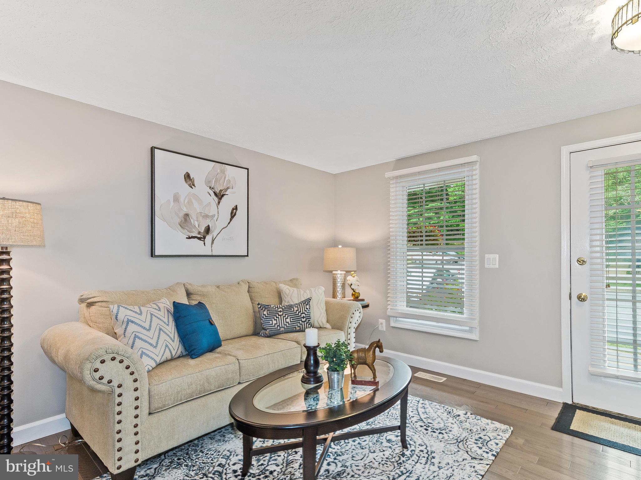 1931 Sagewood Lane Reston, VA 20191 - Photo 5 of 30 a living room with furniture and a window
