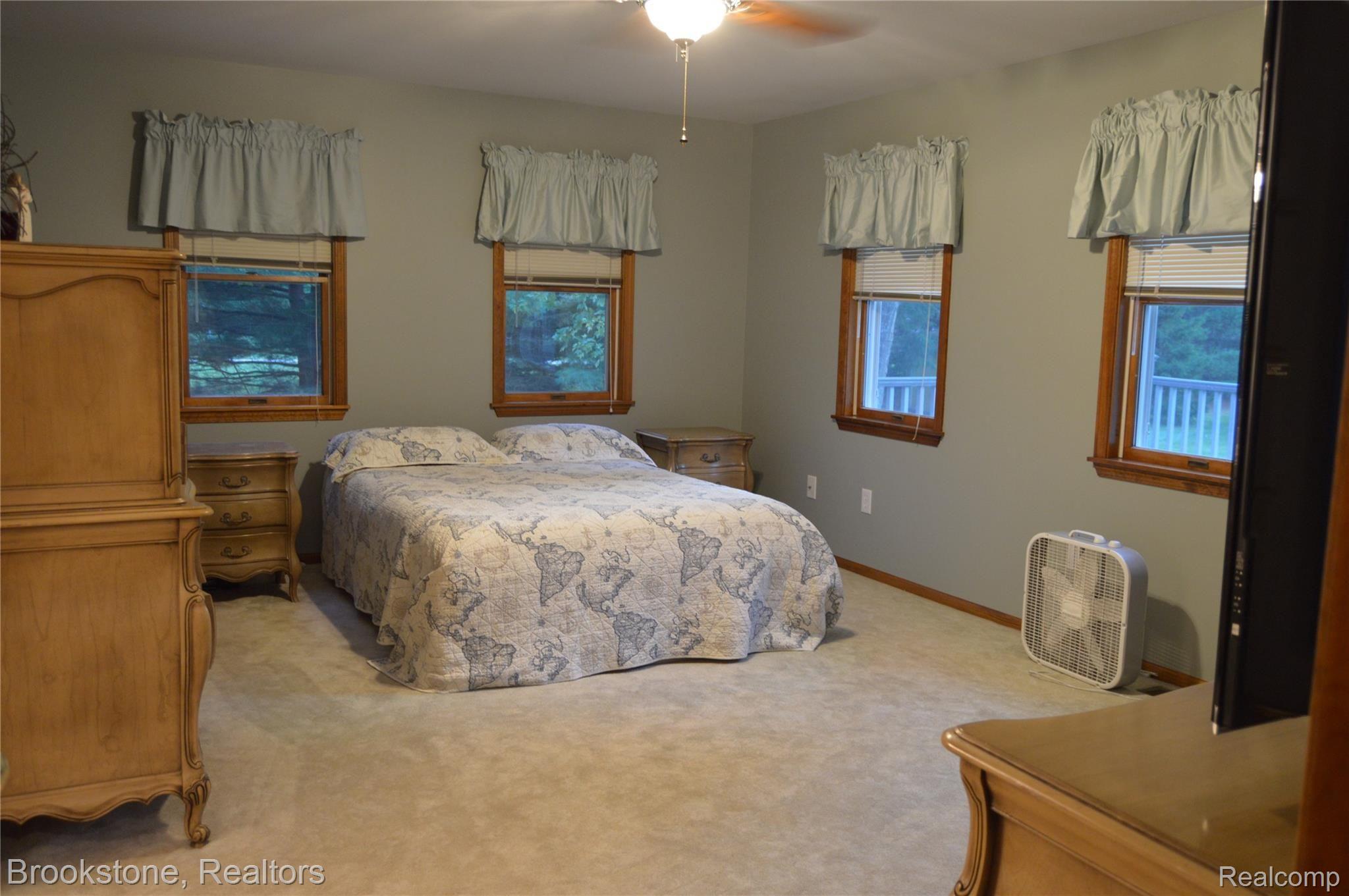 12447 Field Road Clio, MI 48420 - Photo 15 of 37 12447 Field Rd Clio MI 48420 large master bedroom