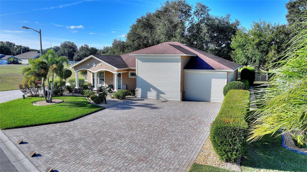 130 Laynewade Road Polk City, FL 33868 - Photo 1 of 41 a front view of a house with a yard and trees