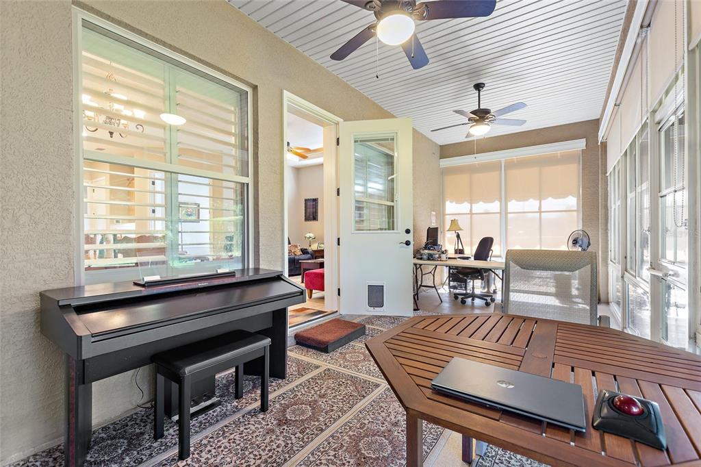 130 Laynewade Road Polk City, FL 33868 - Photo 23 of 41 a living room with furniture and a large window
