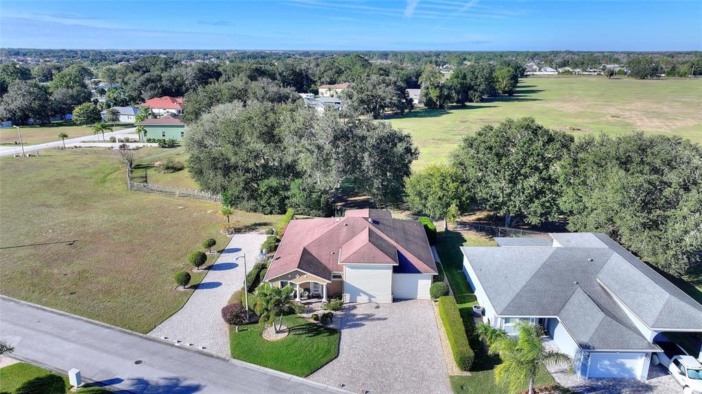 130 Laynewade Road Polk City, FL 33868 - Photo 35 of 41 an aerial view of a house with outdoor space and lake view