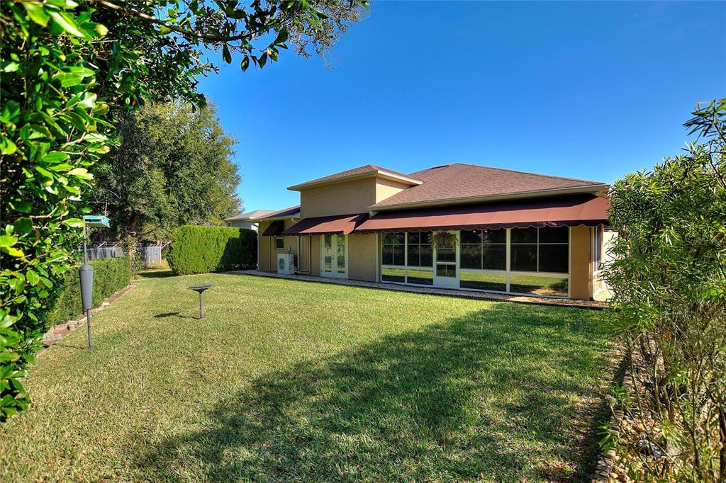 130 Laynewade Road Polk City, FL 33868 - Photo 37 of 41 a front view of a house with a yard