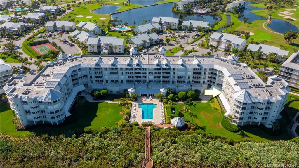 579 Northeast Plantation Road, Unit N107 Jensen Beach, FL 34957 - Photo 2 of 44 a bird view of building
