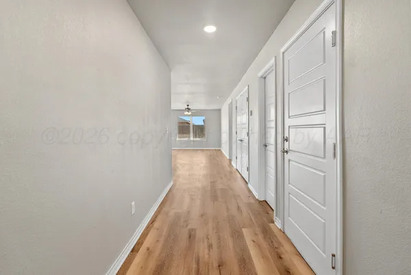 a kitchen with granite countertop a stove and a sink