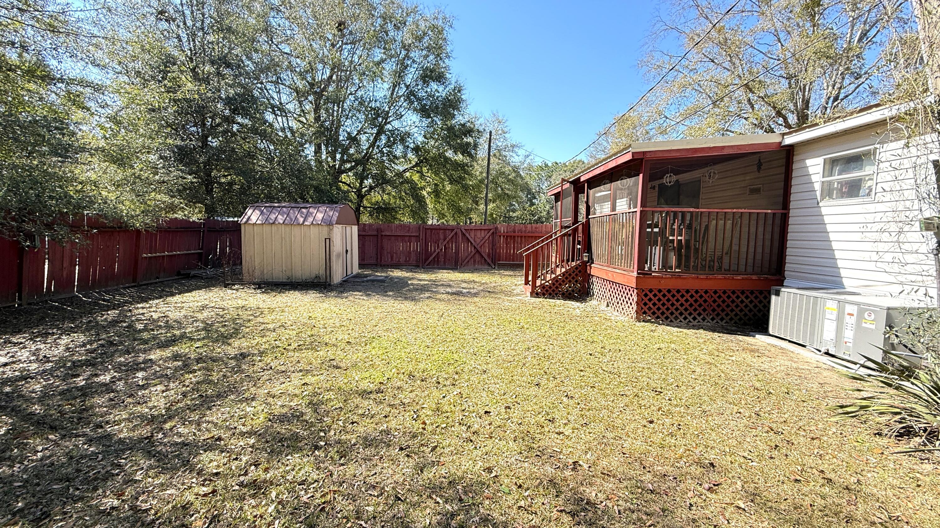 5243 Morris Street Crestview, FL 32539 - Photo 21 of 25 a view of a house with a outdoor space