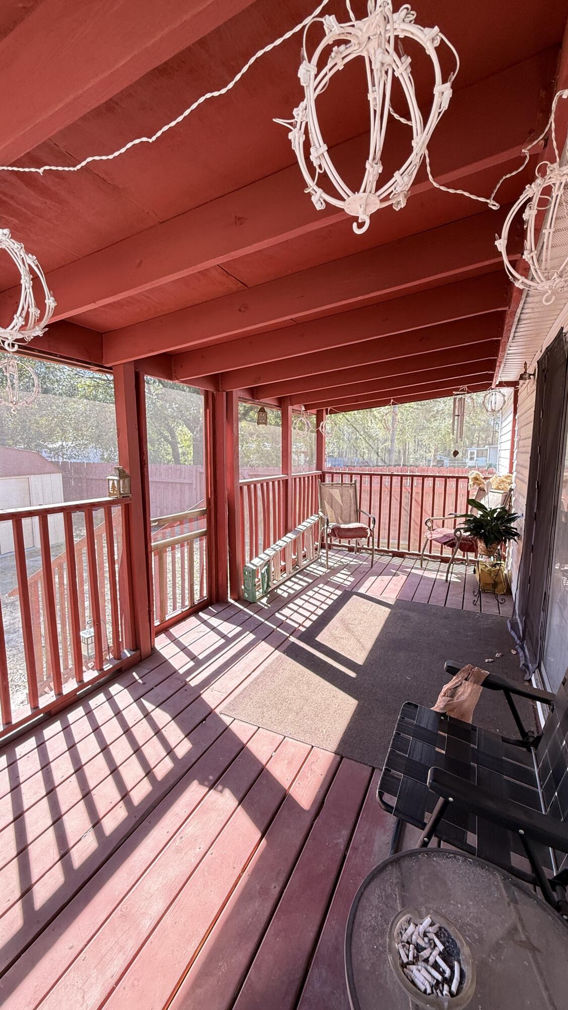 5243 Morris Street Crestview, FL 32539 - Photo 23 of 25 a bedroom with a bed and wooden floor