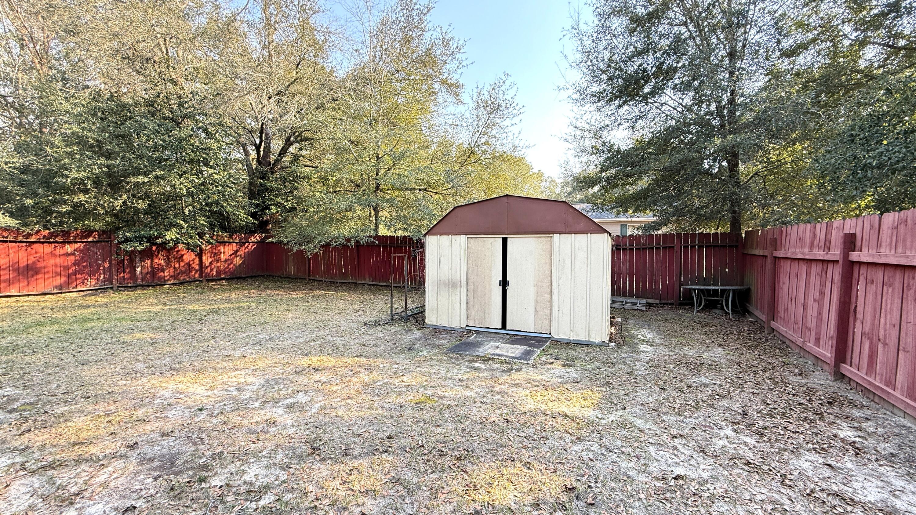 5243 Morris Street Crestview, FL 32539 - Photo 25 of 25 a house view with a backyard space