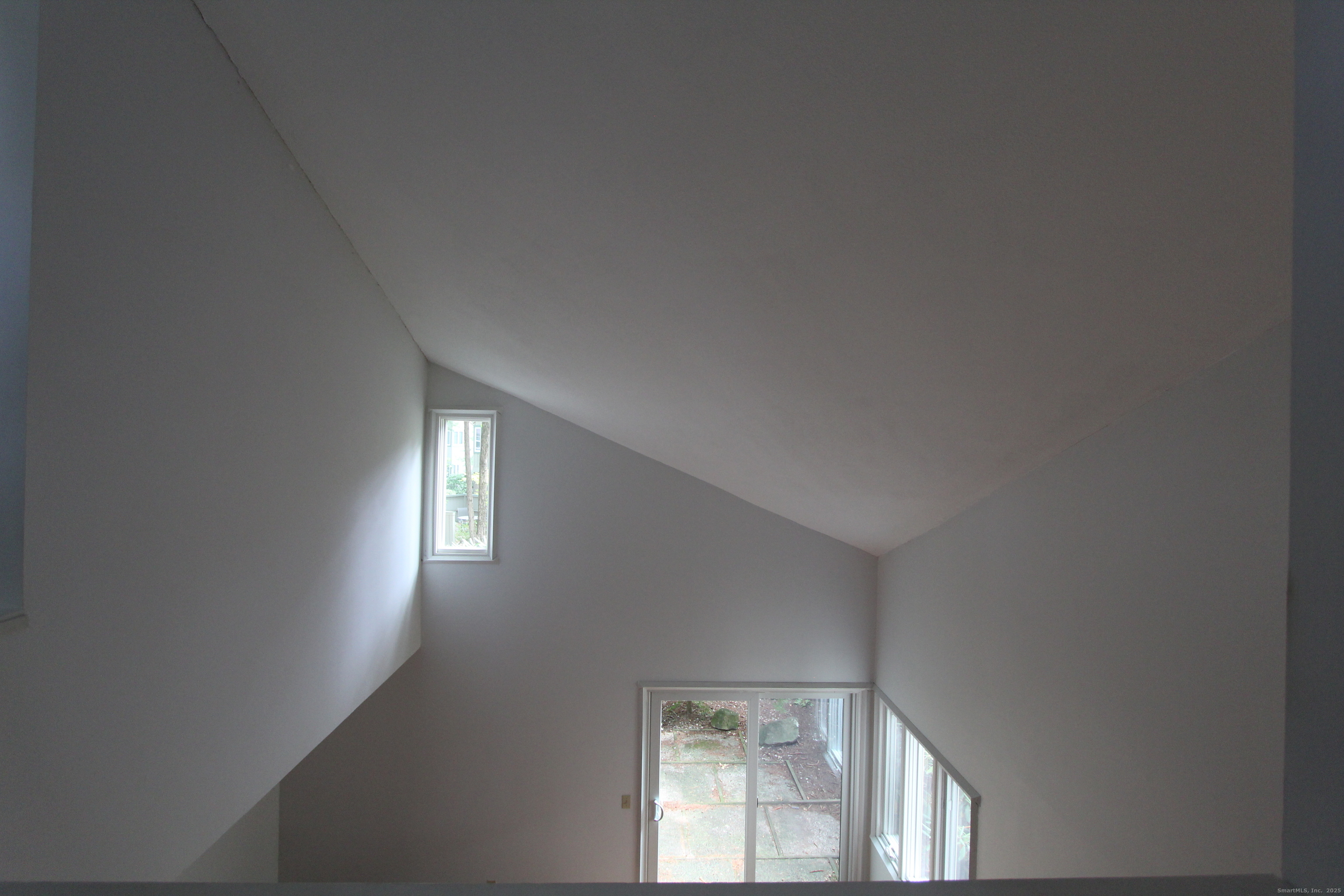 6 Lyle Court, Unit C Farmington, CT 06032 - Photo 12 of 34 an empty room with windows
