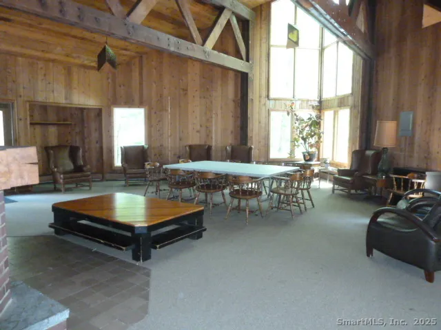 a room with furniture and a large window