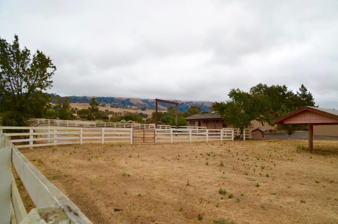 2890 Roop Road Gilroy, CA 95020 - Photo 19 of 22 a view of a lake with a big yard