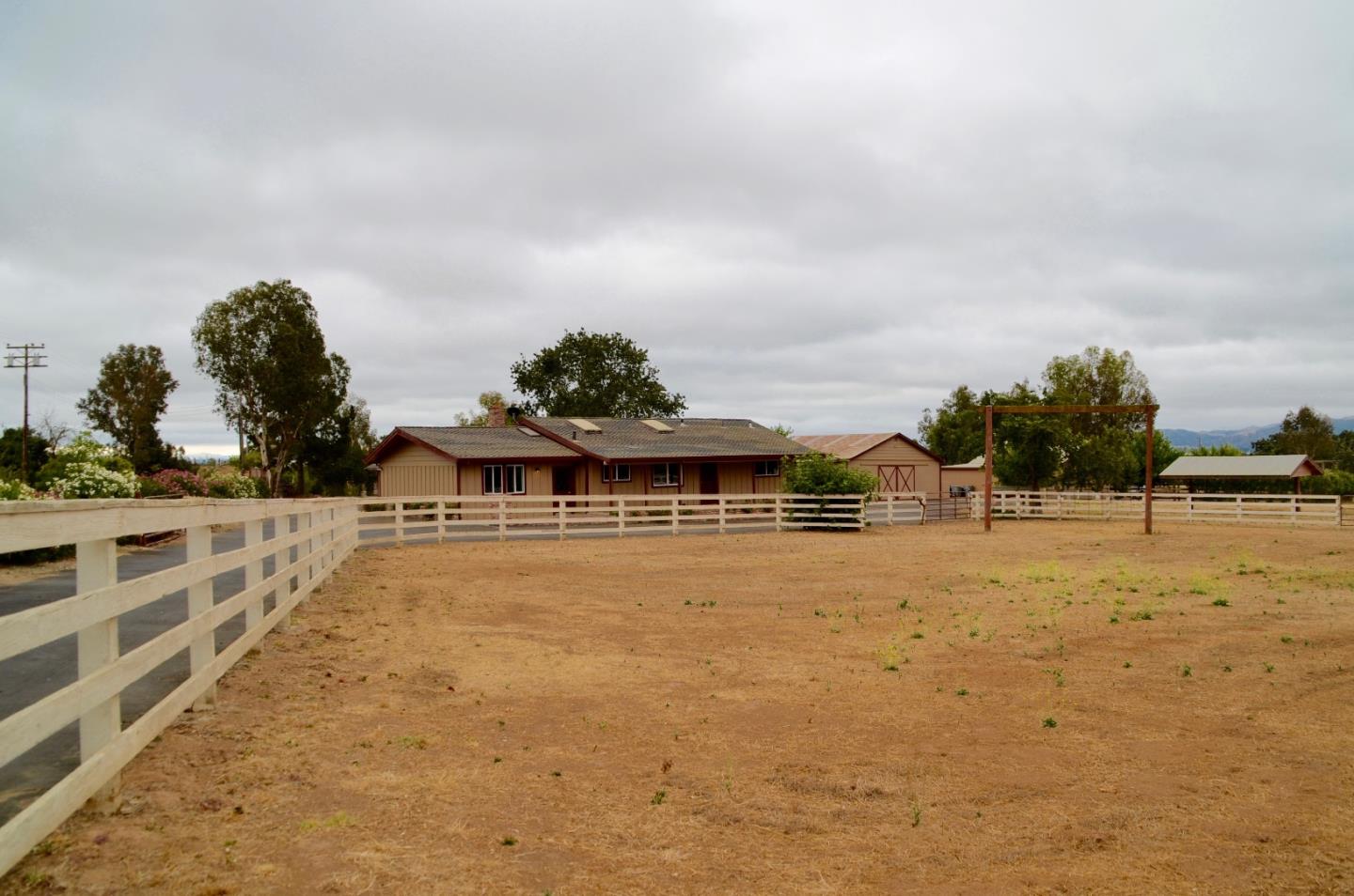 2890 Roop Road Gilroy, CA 95020 - Photo 2 of 22 a view of a house with a yard