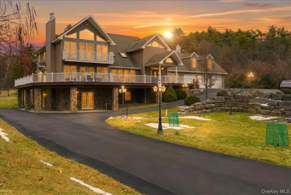 a front view of a house with swimming pool