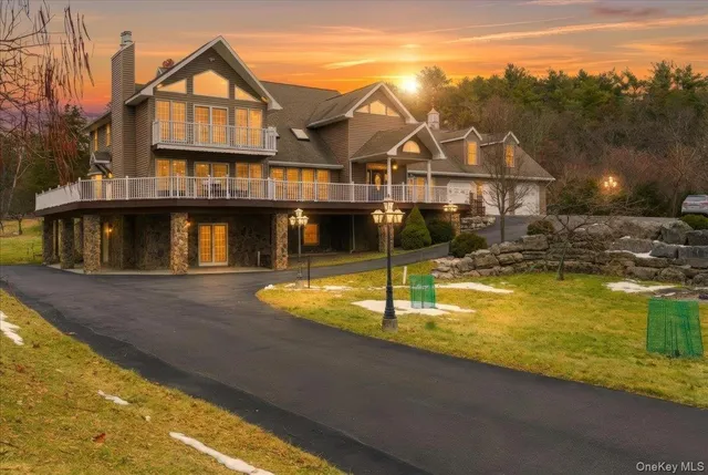 a front view of a house with swimming pool