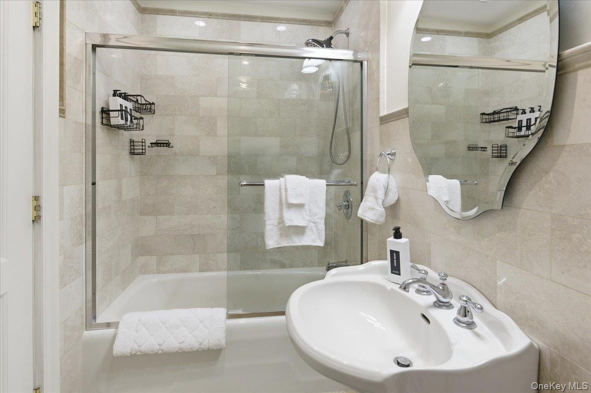 627 Green Lake Road Catskill, NY 12414 - Photo 33 of 50 a bathroom with a sink and a mirror