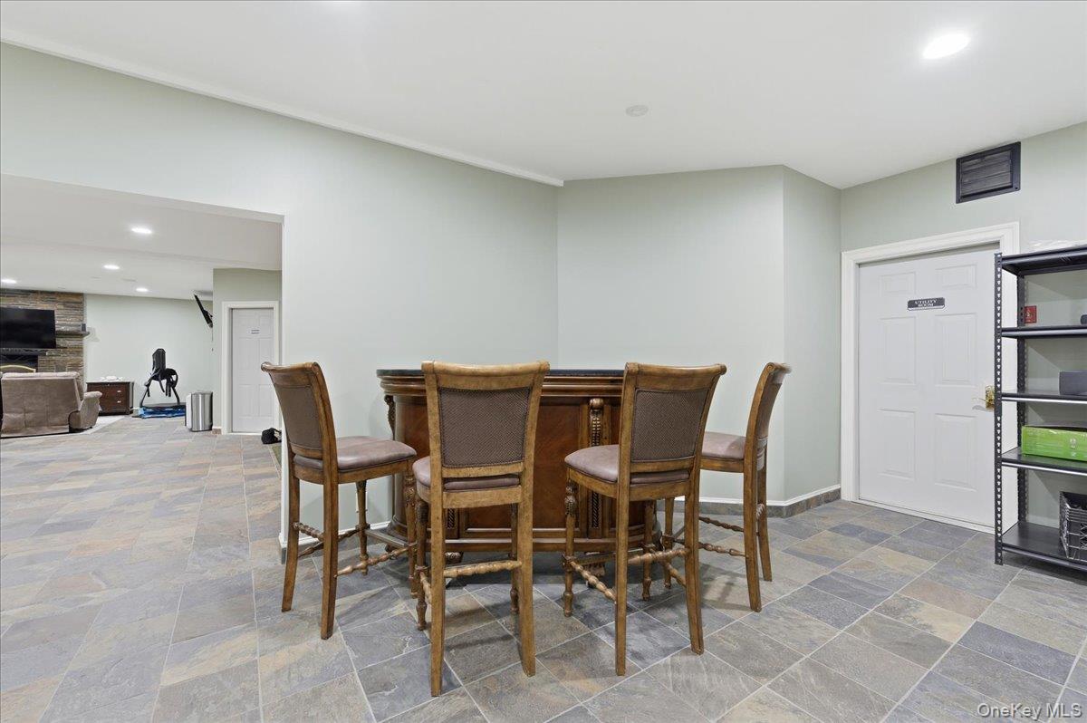 627 Green Lake Road Catskill, NY 12414 - Photo 43 of 50 a view of a dining room with furniture