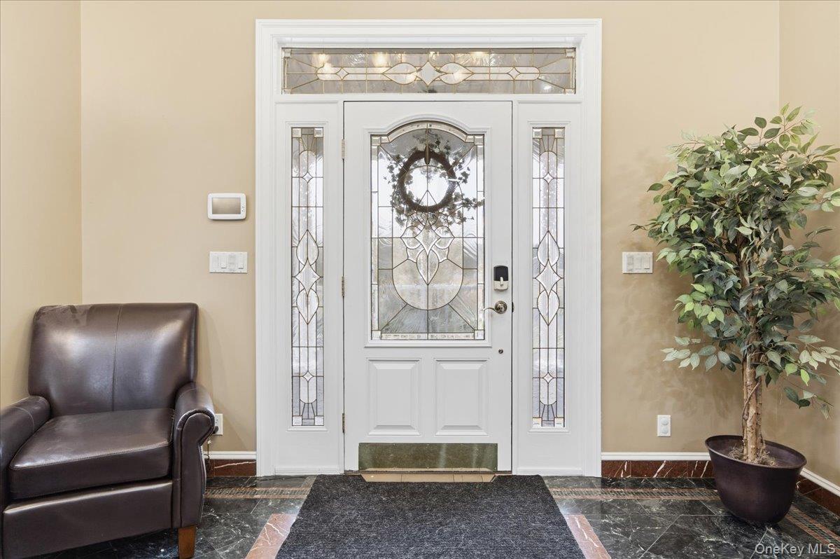 627 Green Lake Road Catskill, NY 12414 - Photo 7 of 50 a living room with furniture and a potted plant