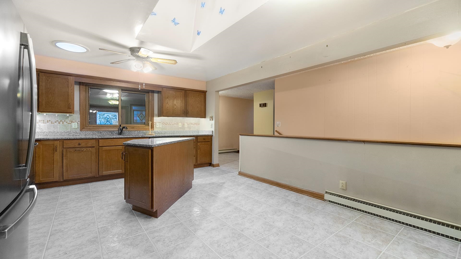 35340 West County Line Road Kirkland, IL 60146 - Photo 17 of 45 a large kitchen with a sink and cabinets