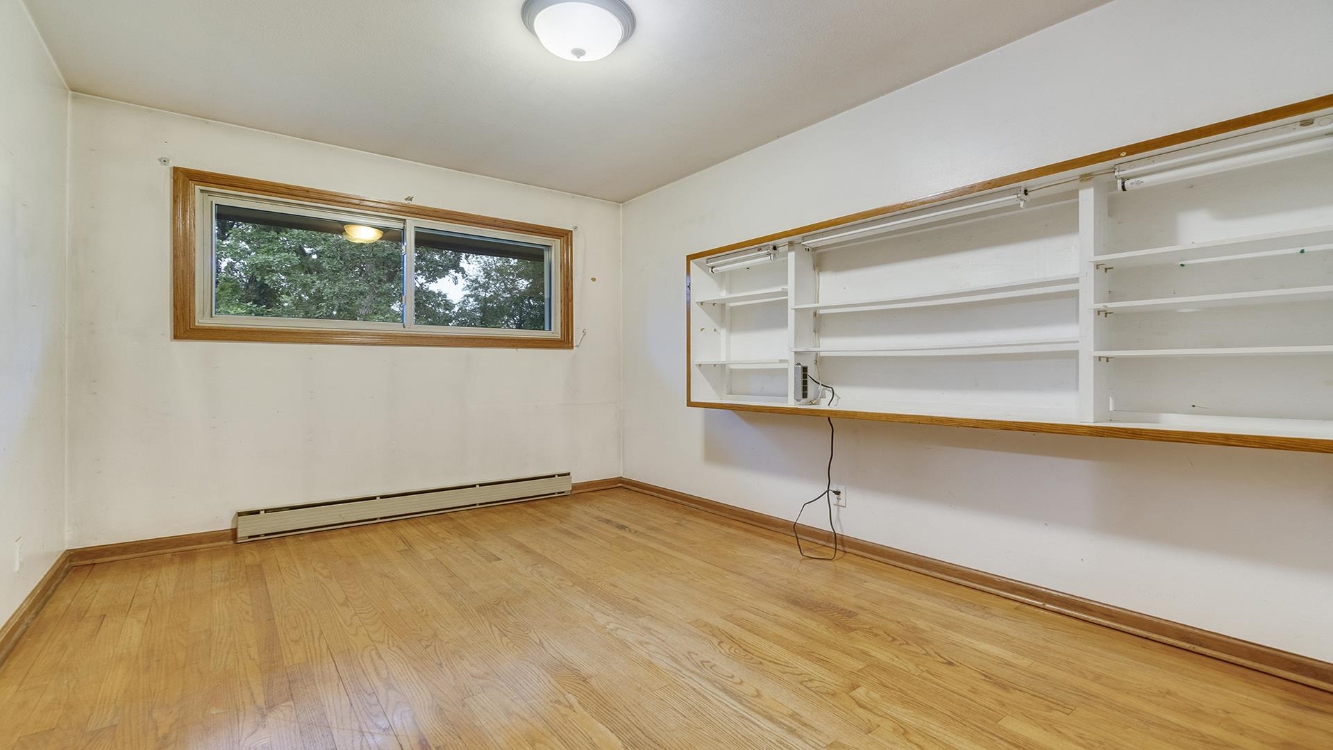 35340 West County Line Road Kirkland, IL 60146 - Photo 26 of 45 a view of an empty room with a window