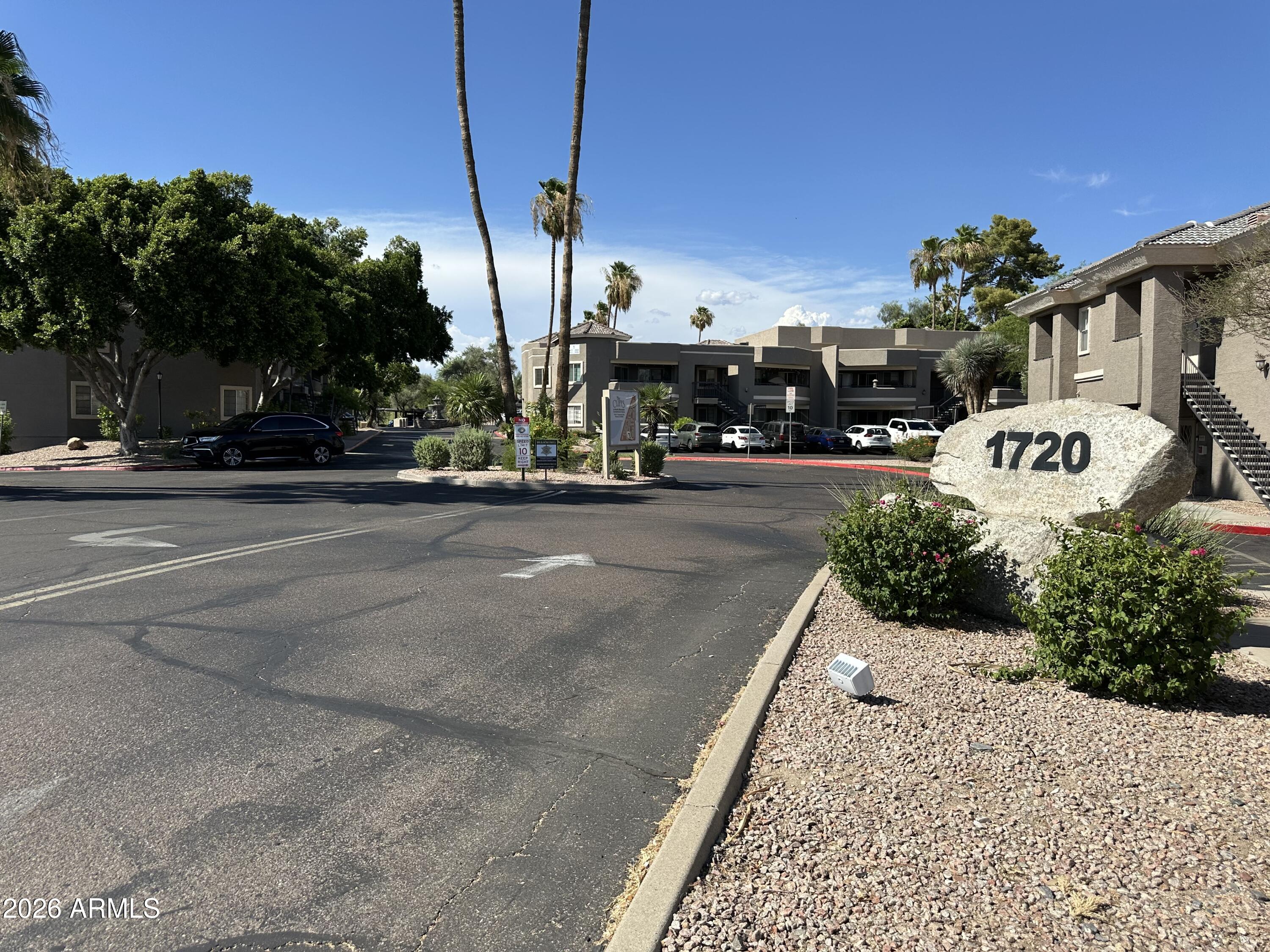1720 East Thunderbird Road, Unit 1019 Phoenix, AZ 85022 - Photo 42 of 47 a view of a street with cars