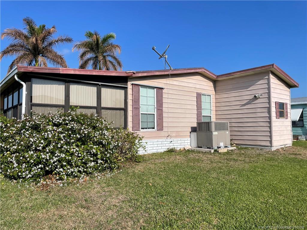14413 Southwest Rake Drive Indiantown, FL 34956 - Photo 5 of 21 Outdoor shed for extra storage.