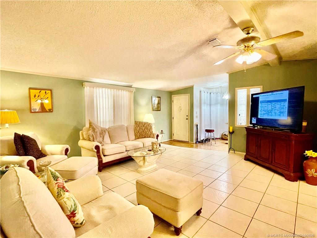 14413 Southwest Rake Drive Indiantown, FL 34956 - Photo 8 of 21 Large TV does not stay