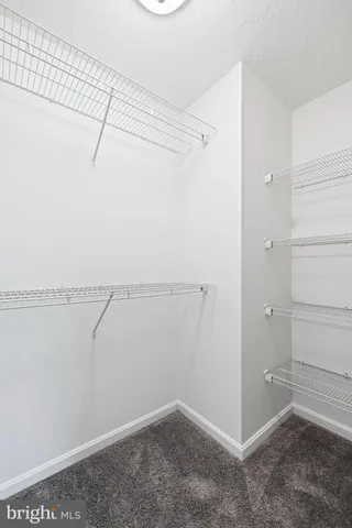 a view of a room with racks on the wall