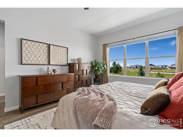 a bathroom with a granite countertop sink mirror and double