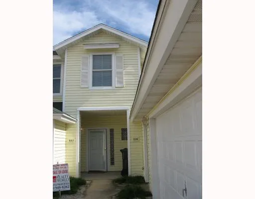 a view of a house with a garage
