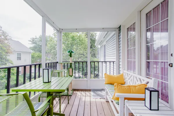 a view of balcony with furniture