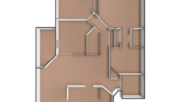 a picture of a bench in front of a wall