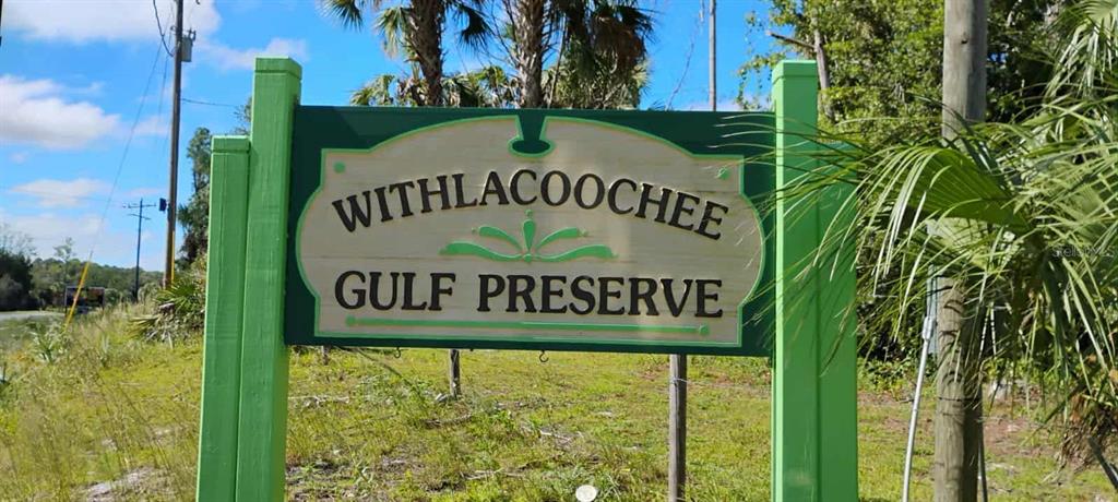 15 65th Street Yankeetown, FL 34498 - Photo 3 of 6 a sign that is on the side of the building