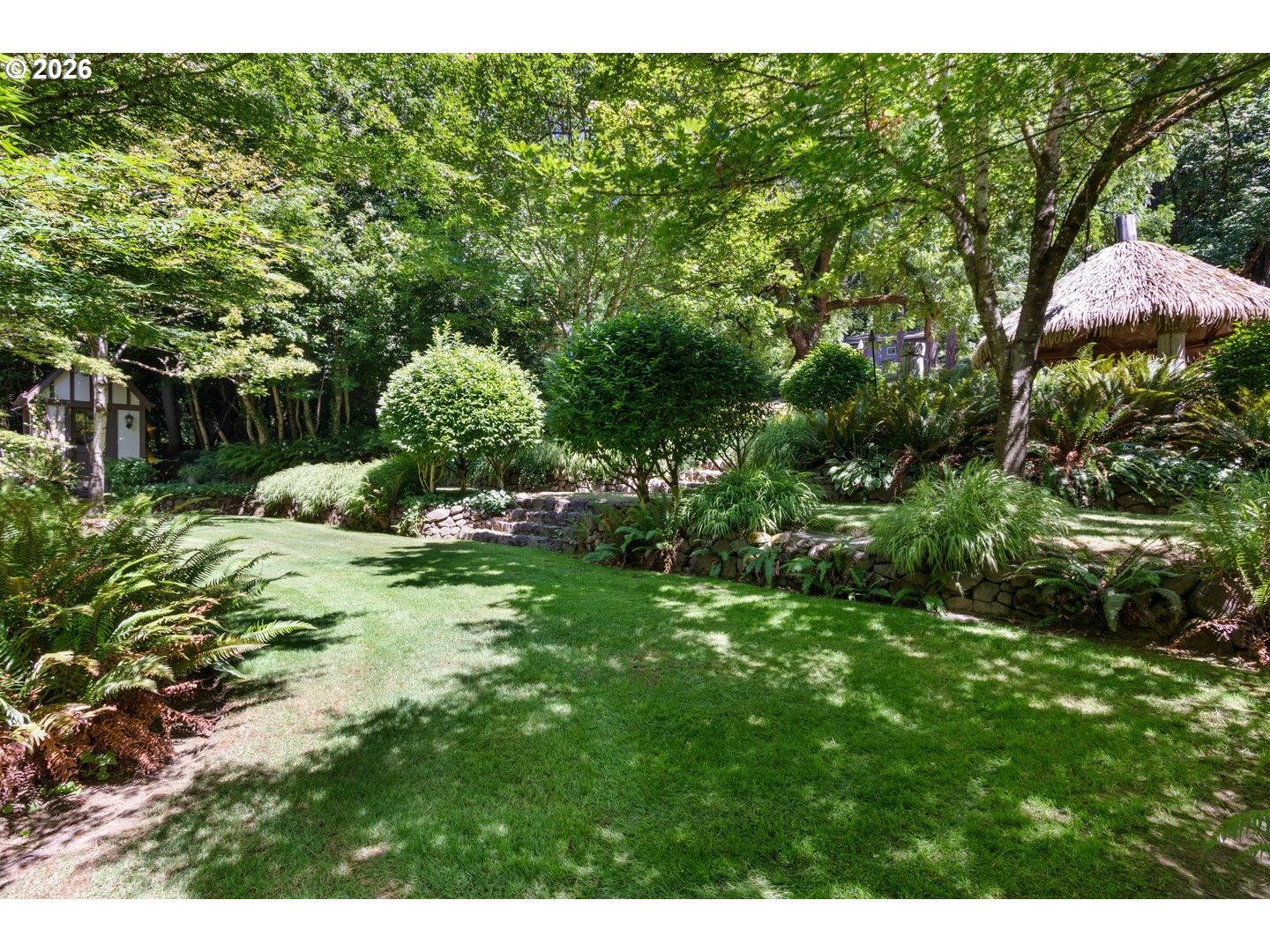 4300 Pacific Way Longview, WA 98632 - Photo 23 of 33 a backyard of a house with lots of green space