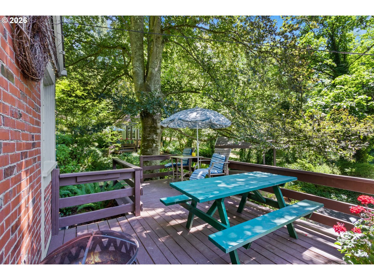 4300 Pacific Way Longview, WA 98632 - Photo 30 of 33 a view of a tables and chairs under an umbrella