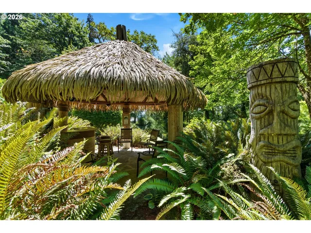 a backyard of a house with lots of green space