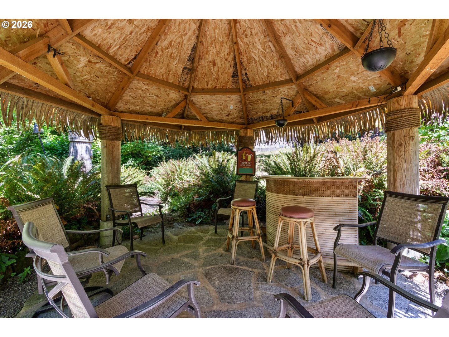 4300 Pacific Way Longview, WA 98632 - Photo 32 of 33 a patio with glass top table and chairs