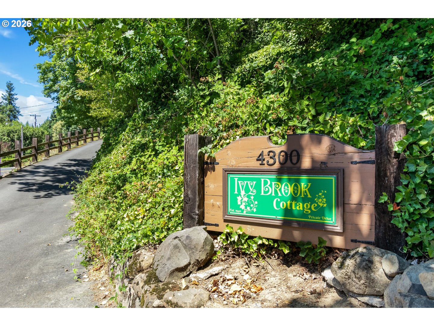 4300 Pacific Way Longview, WA 98632 - Photo 5 of 33 a view of a garden with a bench