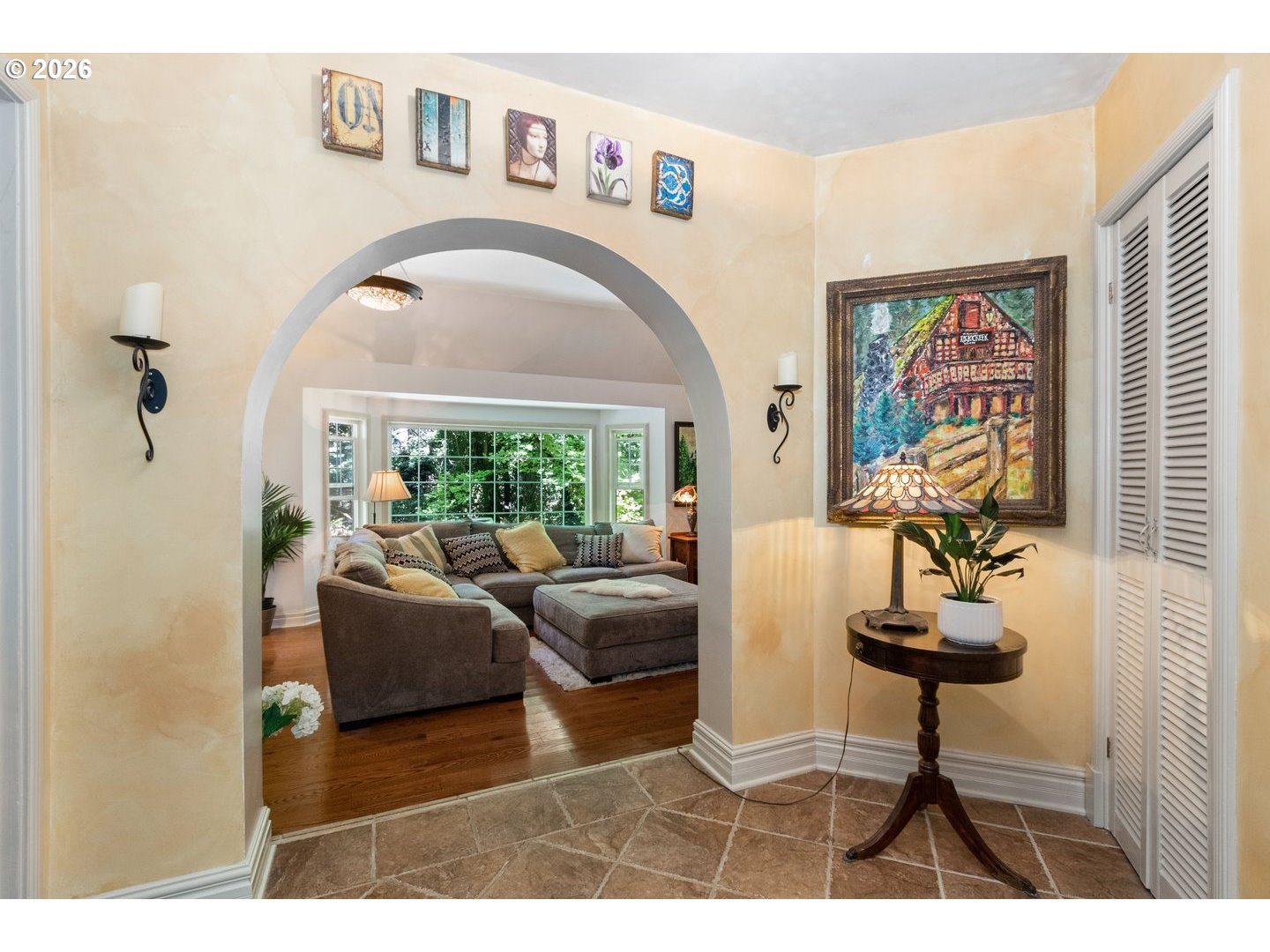 4300 Pacific Way Longview, WA 98632 - Photo 6 of 33 a living room with fireplace furniture a rug and a large window