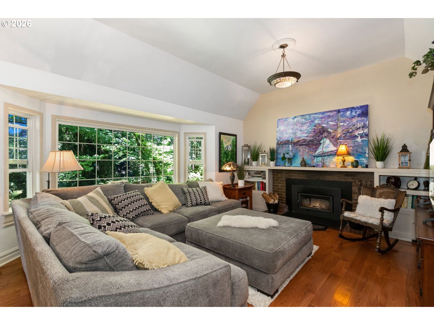 4300 Pacific Way Longview, WA 98632 - Photo 9 of 33 a living room with furniture a fireplace and a large window