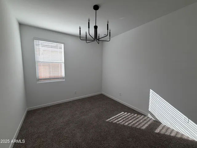 en empty room with a empty space and a window