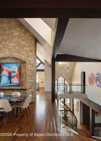 a picture of a living room with a rug