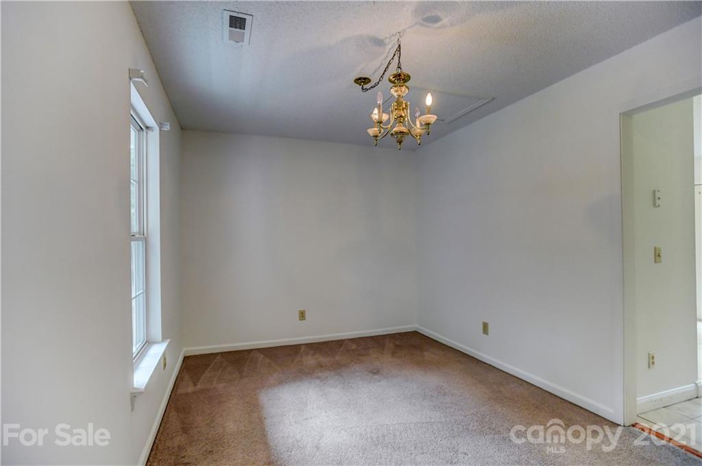 239 Valleyview Road Mooresville, NC 28117 - Photo 15 of 41 an empty room with a window