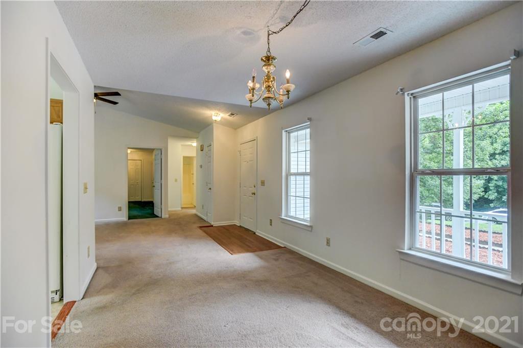 239 Valleyview Road Mooresville, NC 28117 - Photo 18 of 41 a view of an empty room with a window