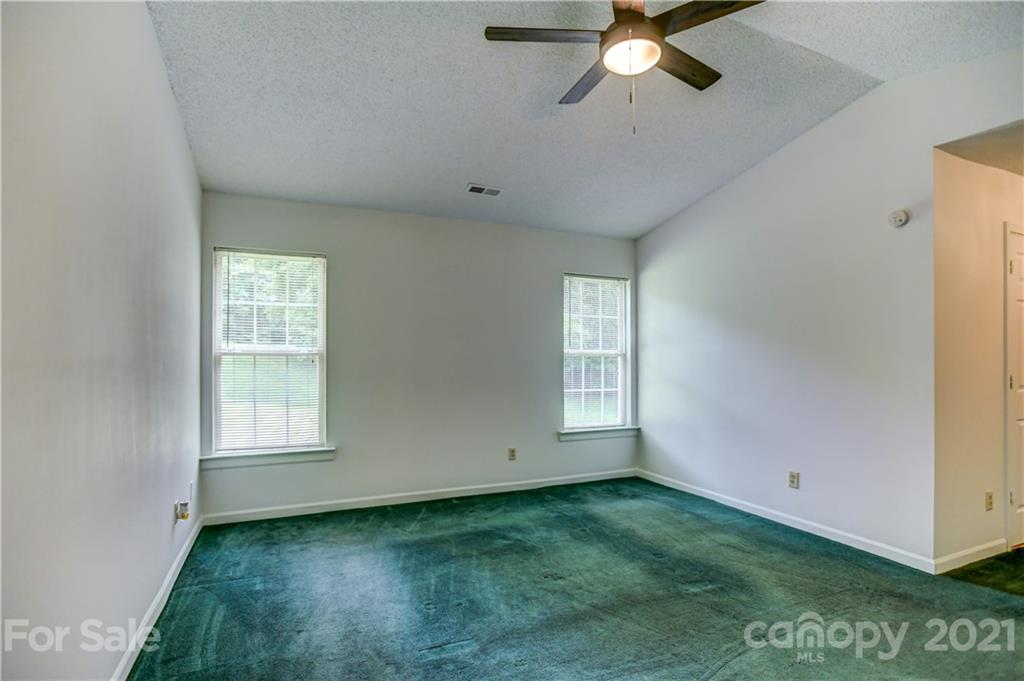 239 Valleyview Road Mooresville, NC 28117 - Photo 19 of 41 a view of an empty room with a window