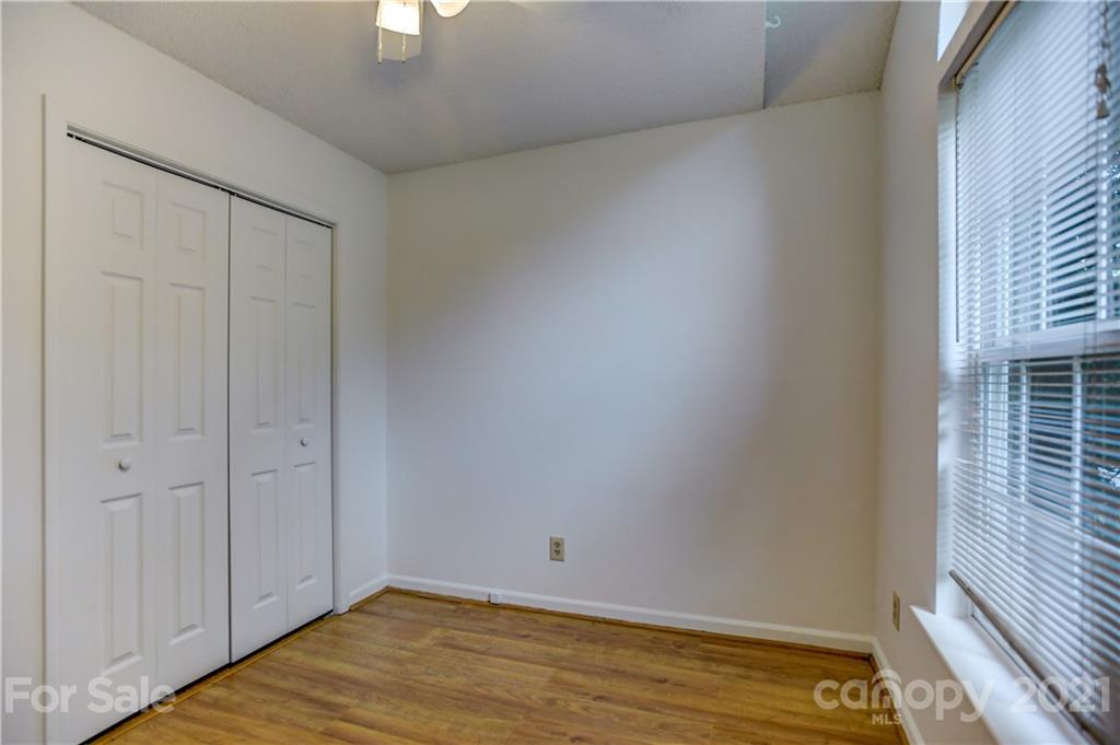 239 Valleyview Road Mooresville, NC 28117 - Photo 26 of 41 a view of room with window and hardwood floor